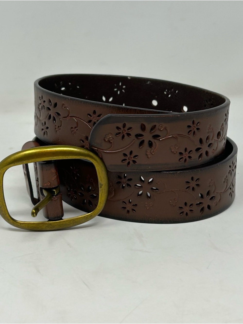 Cutout brown leather belt